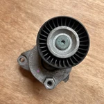 Genuine Mercedes Oem W204 C63 M156 Tensioner Pulley Bracket Engine A1562000570. Fixed Price $70.36.