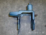 2001-2004 Grand Caravan 3.3L Left Drivers Side Transmission Mount Bracket. Fixed Price $20.00.