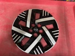 Genuine Nissan Wheel Cover 40315-7LA0B. Fixed Price $107.00.