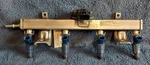 2006 Ford Escape 2.3L 4 Cylinder Fuel Injection Rail Injector Assy 5L8G-9D280-AD. Fixed Price $52.24.